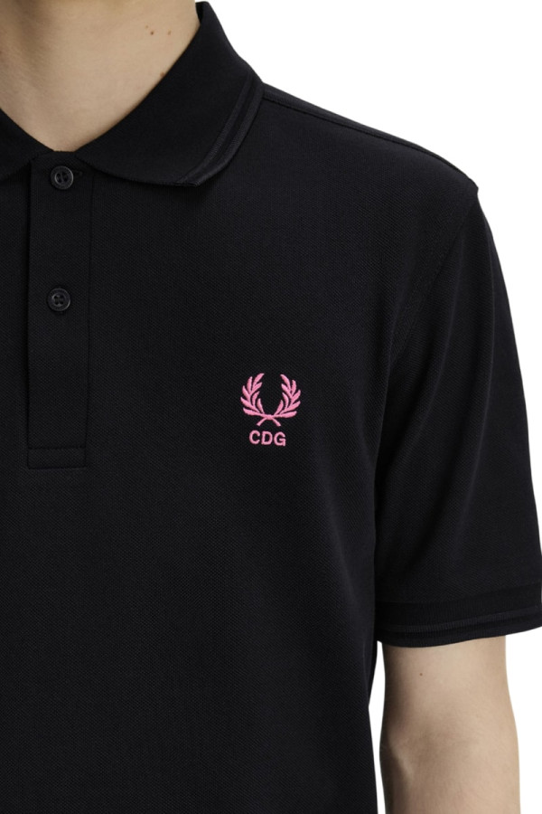 COMME des GARÇONS Imbues Neon Accents To Fred Perry’s Piqué Polo Shirts