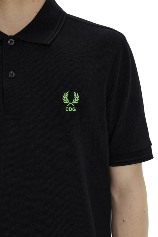 COMME des GARÇONS Imbues Neon Accents To Fred Perry’s Piqué Polo Shirts