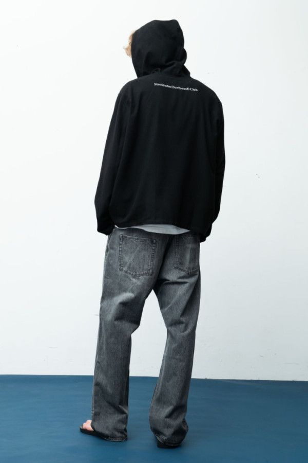 Stockholm Surfboard Club and RHC Turn the Icon Tag Navy for the "Black Beach" Capsule