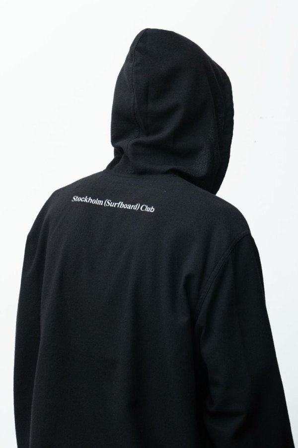 Stockholm Surfboard Club and RHC Turn the Icon Tag Navy for the "Black Beach" Capsule