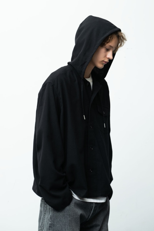 Stockholm Surfboard Club and RHC Turn the Icon Tag Navy for the "Black Beach" Capsule