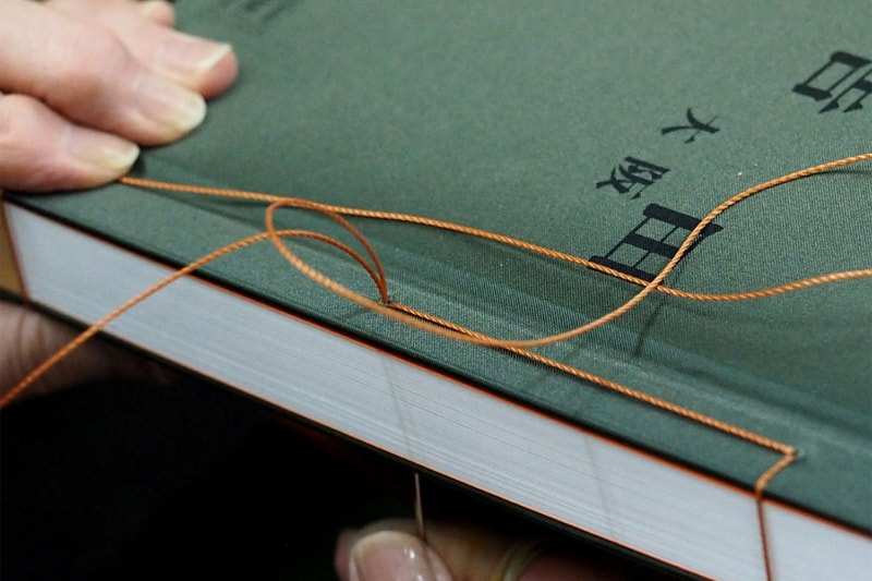 Yoshida & Co. Bookbinds Its 90-Year History Using the Same Thread That Sews Its Bags
