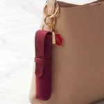 Pure Trade creates a collectible bag charm for Guerlain KissKiss